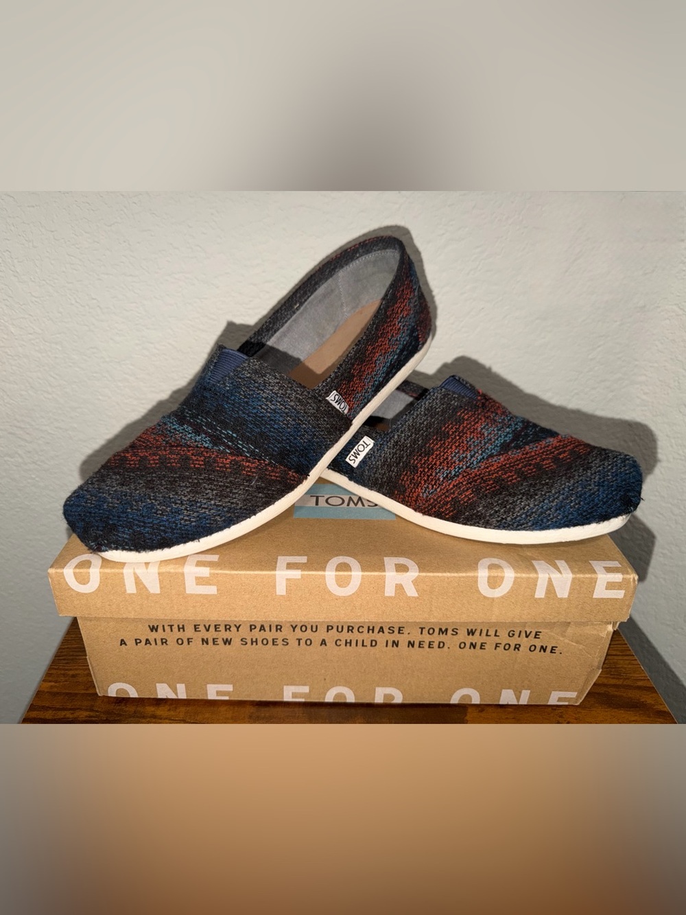 Toms Slip-On Shoes in Navy, Rust, and Black Knit